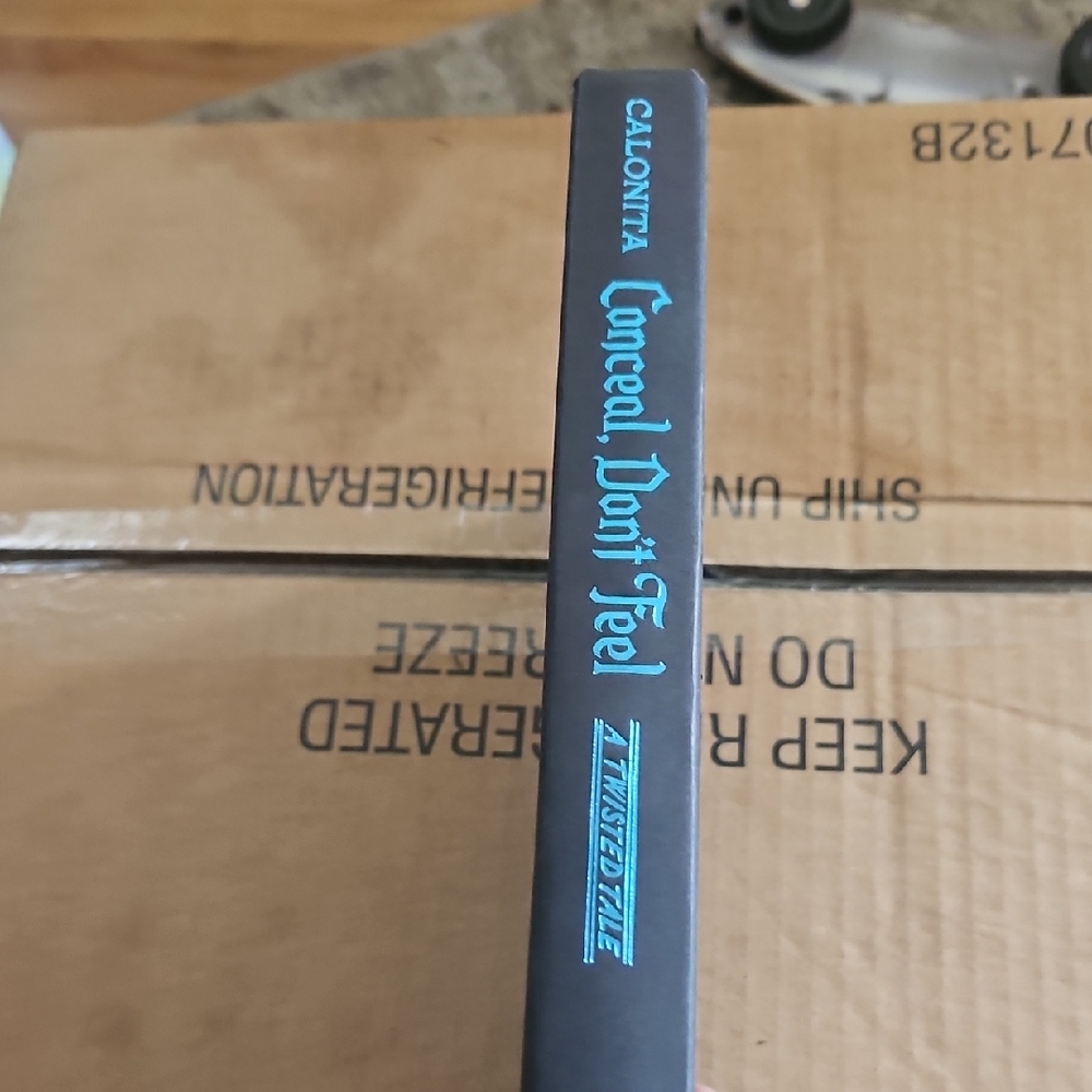 Conceal, Don't Feel Book by Calonita